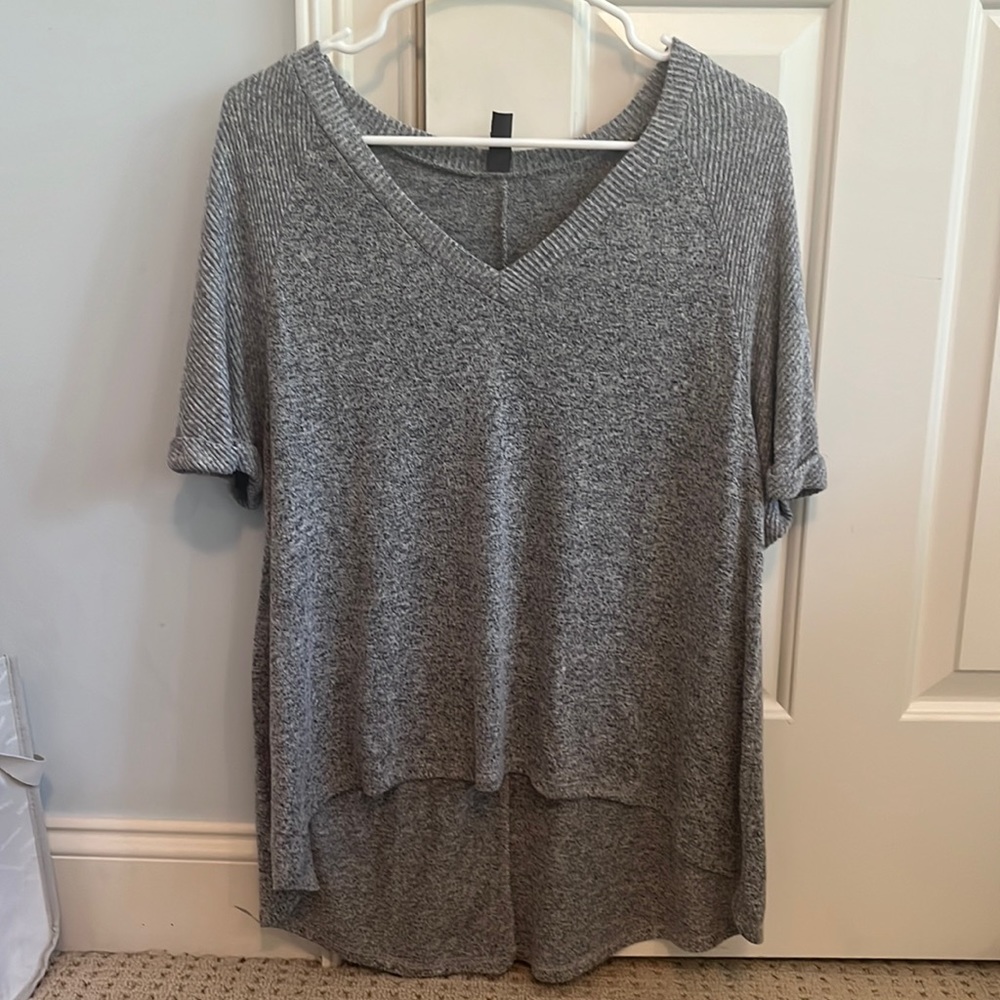 women’s medium low cut v-neck soft grey shirt